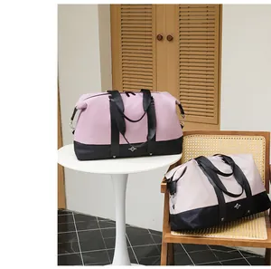 Detail view of two large capacity stylish travel bags on a table and chair setting