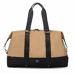 Detailed front view of a khaki and black large capacity travel duffel bag for women.