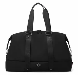 Professional front view of a black large capacity gym bag with FASHIONBAG logo detail