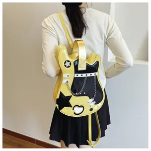 Model wearing a creative yellow and black guitar-shaped novelty backpack for women