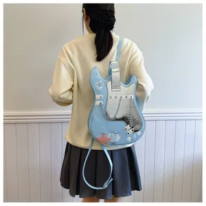 Creative guitar-shaped backpack in light blue with silver metallic accents and chains