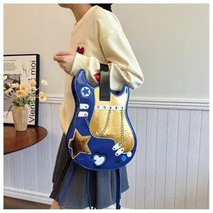 Close-up of a creative guitar-shaped backpack with blue and gold patent leather finish