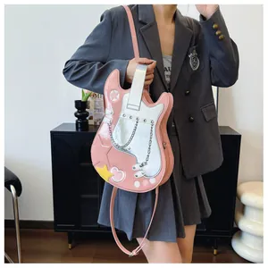 Unique creative pink guitar shaped crossbody bag featuring metallic chain details