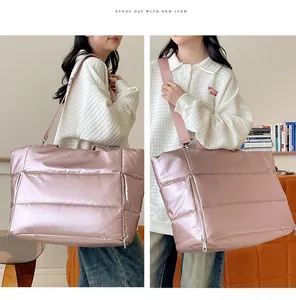 High capacity metallic pink quilted puffer travel bag displayed in two different views