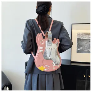 Creative pink and silver guitar-shaped backpack with star appliques and chain detail.