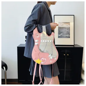 Stylish pink guitar-shaped backpack with star details shown on a shoulder.