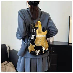 Rear view of a model wearing the creative guitar-shaped black and gold backpack