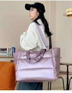 Large purple quilted travel bag for sports, fitness, and weekend trips for women