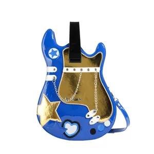 Unique creative guitar-shaped crossbody bag in blue and gold with metallic star details