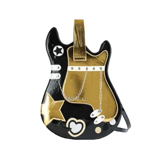 Detailed view of creative guitar shaped crossbody bag with gold star and metal chain accents