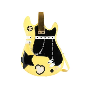 Front detail of a creative guitar-shaped shoulder bag in yellow and black lacquer
