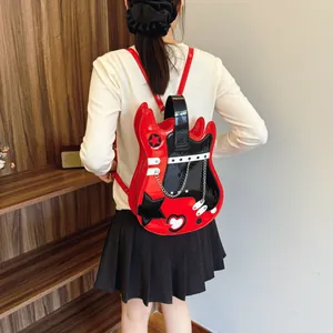 Creative guitar-shaped backpack in vibrant red and black glossy patent leather finish