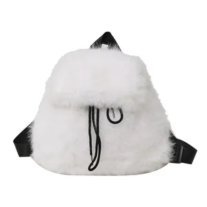 Macro detail of a plush white faux fur backpack with black functional drawstrings