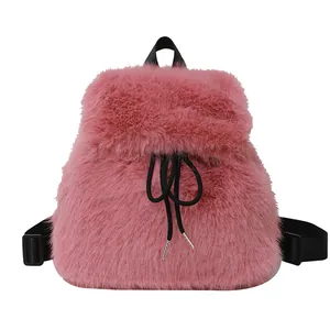 Stylish pink faux fur plush backpack featuring a cute drawstring closure and black straps