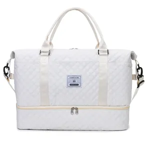 Premium white quilted travel bag with separate shoe compartment and sturdy handles