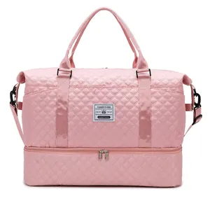 Pink quilted travel duffel bag with shoe compartment and wet dry separation design