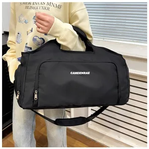 Large capacity black travel duffel bag with shoulder strap for gym or short trips