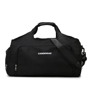 Durable black nylon travel duffel bag featuring a shoulder strap for sports and gym use