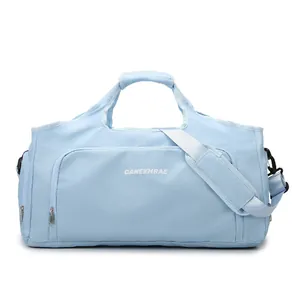 Light blue large capacity travel duffle bag with shoulder strap and front pocket.