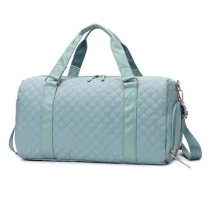 Quilted mint green travel duffel bag with dry wet separation for fitness and travel