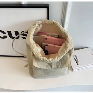 Interior view of the large capacity nylon drawstring bucket bag showing its ample space.