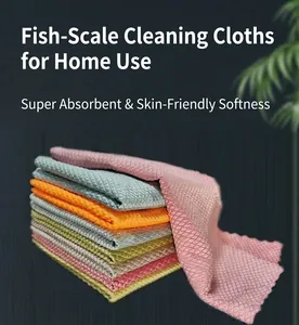 Close-up of stacked colorful fish scale microfiber cleaning cloths showing texture