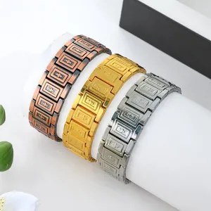 Detailed view of men's magnetic bracelets in copper, gold, and silver finishes