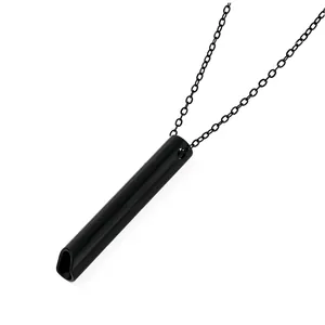 Detail view of a sleek black titanium steel breathing meditation whistle necklace.