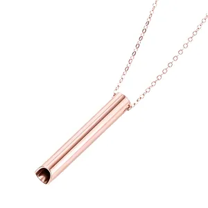 Detail view of rose gold titanium steel breathing necklace for meditation relief