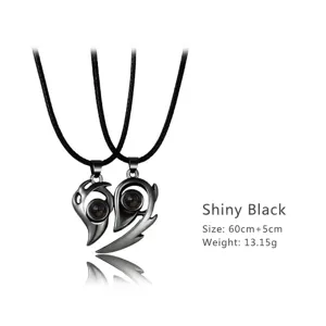 Close-up of black magnetic couple heart projection necklace with specification details