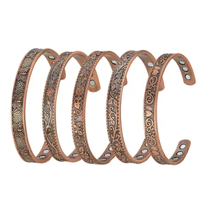 Set of 5 antique copper magnetic therapy bracelets with floral and butterfly patterns