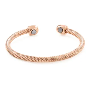 Elegant rose gold magnetic cable bracelet with twisted wire design and open cuff style