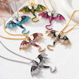 Detailed view of colorful oil-dripping dragon pendants with sparkling crystal accents.