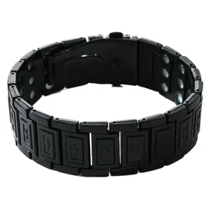 Detailed view of a wide black magnetic bracelet featuring embossed link patterns