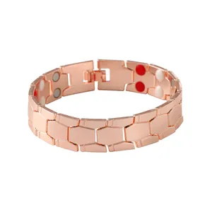 Detailed view of a rose gold magnetic bracelet with hexagonal links and therapy magnets.