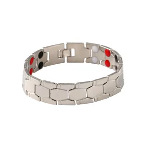 Detail view of men's silver hexagonal link bracelet with internal magnetic stones