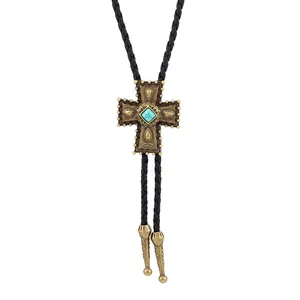 Vintage Western-Cowboy-Bolo-Tie mit Türkis-Kreuz-Anhänger und schwarzer geflochtener Schnur.