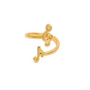 Detailed macro view of a golden music note open adjustable ring for music lovers