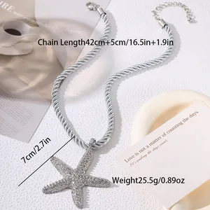 Detailed view of oversized rhinestone starfish pendant with silver rope chain measurements