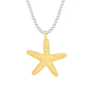 Golden textured starfish pendant necklace with nautical rope chain for beach vacations