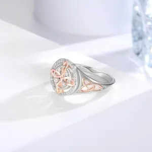 Detailed macro view of two-tone Celtic knot ring featuring sparkly white zirconia