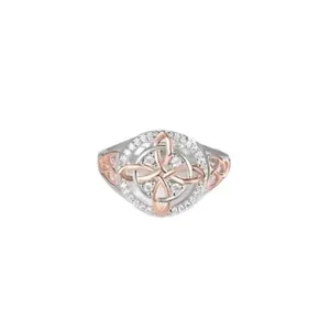 Elegant two-tone zircon ring featuring a Celtic knot design on a white background.
