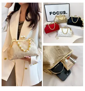 Detailed view of Chinese style pearl beaded clasp bags in multiple colors and capacity