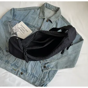 Interior view showing the compartments of a large black dumpling bag.