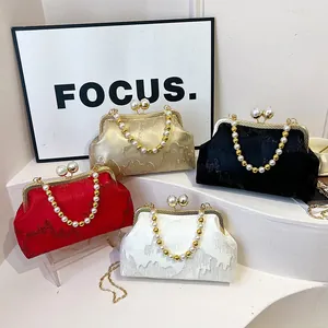 Elegant Chinese style embroidered clutch bags with pearl beaded handles and kiss-lock