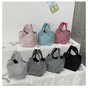 Collection of sparkling rhinestone bucket handbags in various colors with chain straps