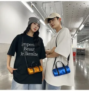 Models wearing mini metallic barrel crossbody bags in vibrant orange and blue colors