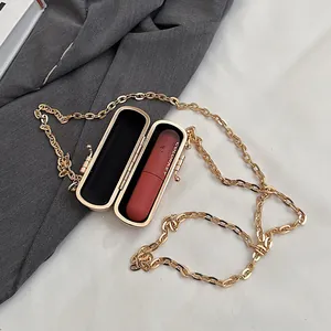 Elegant gold mini chain lipstick bag for party and evening events with luxury metal finish