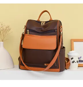 Elegante mochila de cuero sintético bicolor para mujer con gran capacidad y bolsillos