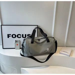Large capacity grey duffel bag for short travel, business trips, and maternity storage